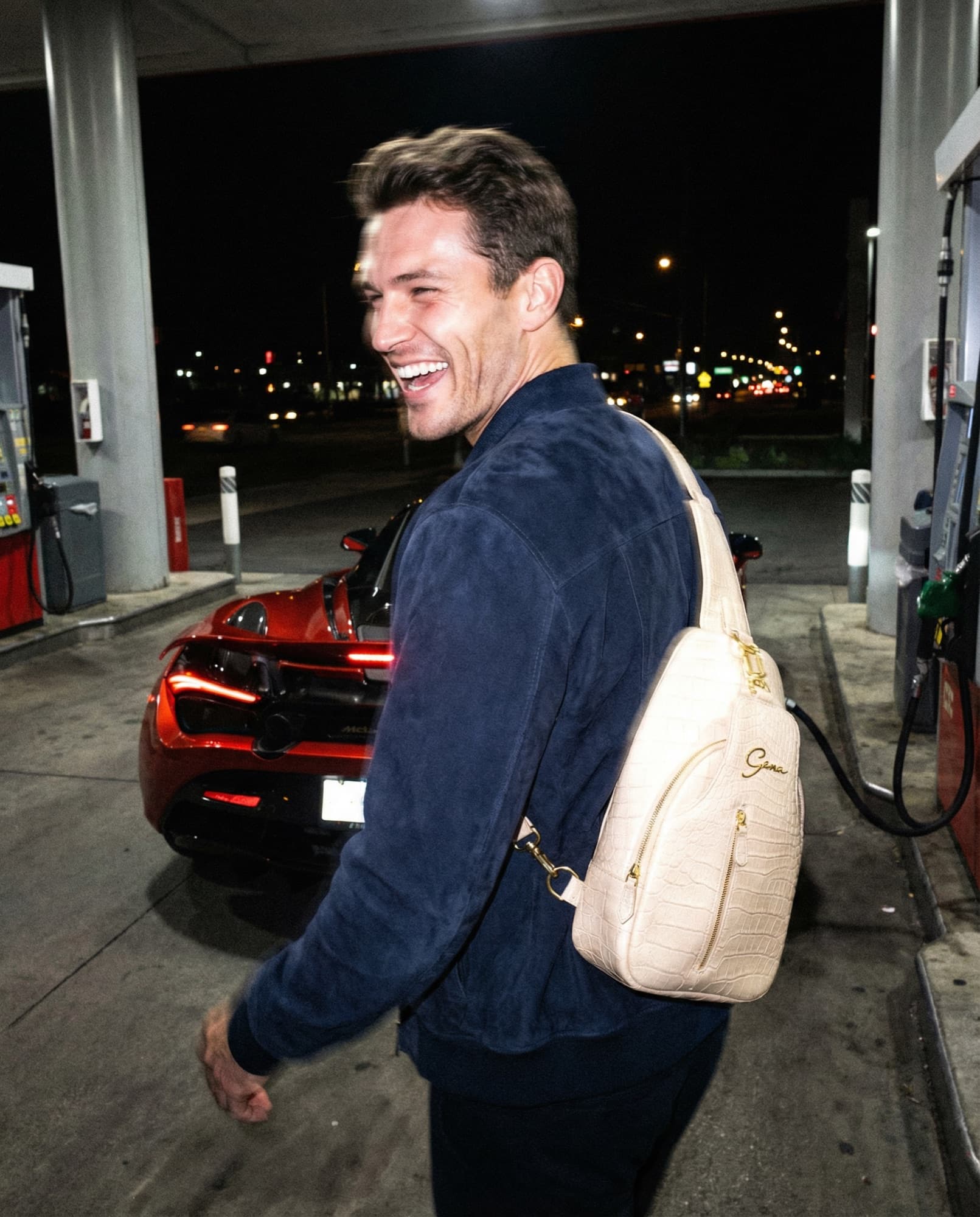 Beige GENA sling bag worn at a night fuel stop